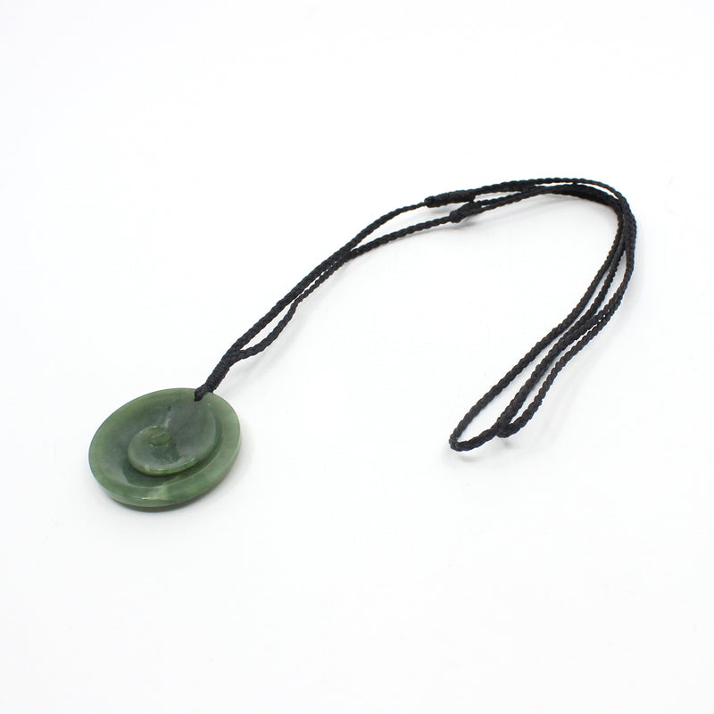 Disc with Koru Pounamu Pendant | by Alex Sands