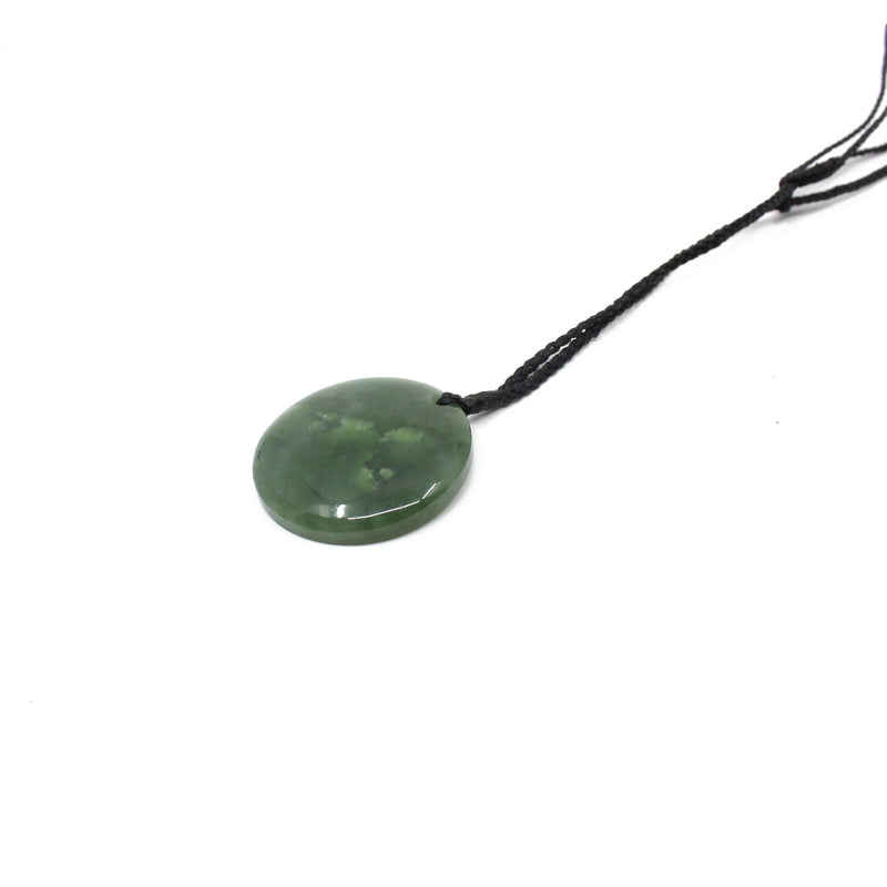 Disc with Koru Pounamu Pendant | by Alex Sands