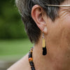 Saddleback Feather Earrings | by Remix Plastic